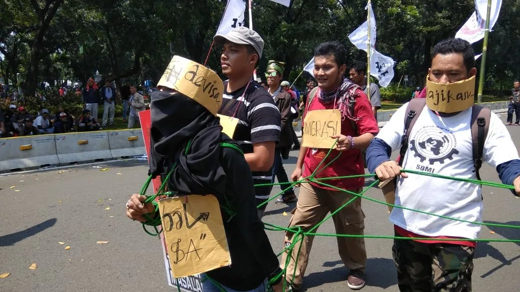 Gelar Teatrikal, SBMI Tuntut Perlindungan Buruh Migran